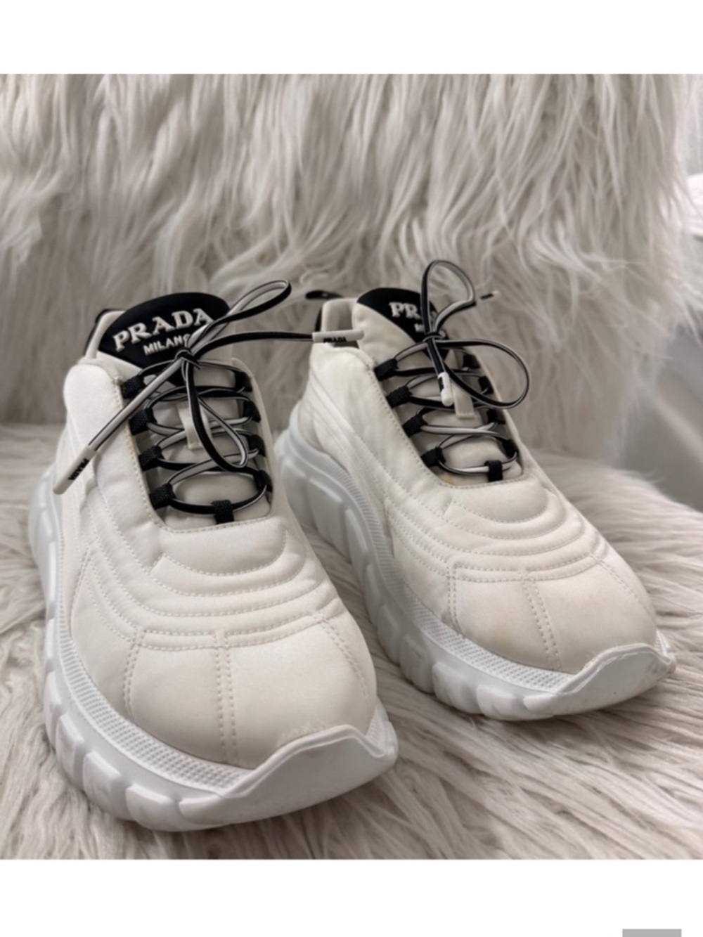 Prada Cream Sneakers with Black Trim